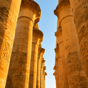 Ancient Egyptian temple corridor in sunlight