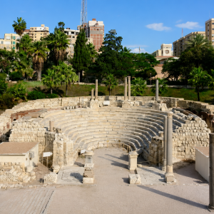 Ancient amphitheater amidst city life