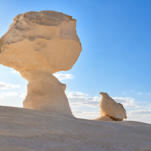 Desert hoodoos under bright skies