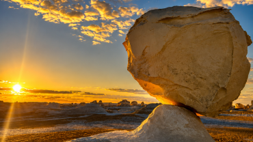 Desert sunset with balanced rock