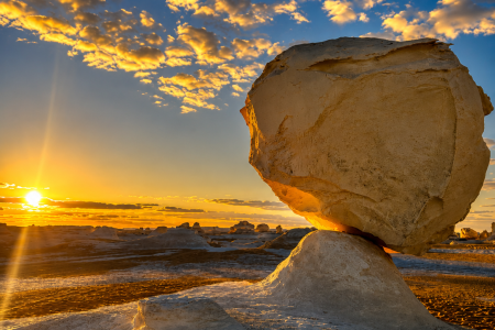 Desert sunset with balanced rock