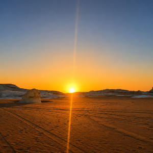 Desert sunset with distant mesas