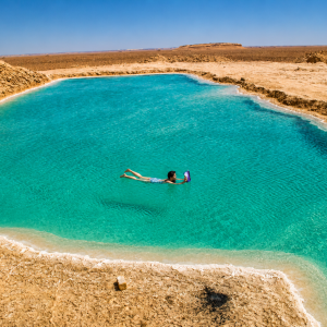 Floating in the turquoise desert lagoon