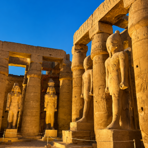 Majestic pharaohs in sunlit temple ruins