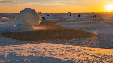 Serene sunset over a white desert