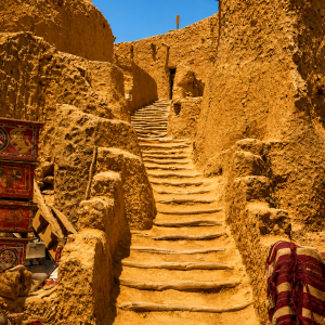 Sunlit path through ancient village