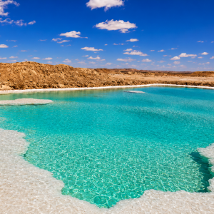 Turquoise lagoon in a desert landscape 2