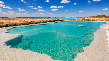 Turquoise lagoon in a desert landscape