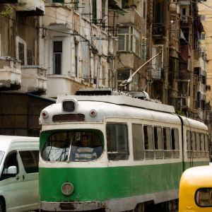 Vintage tram in a bustling city street